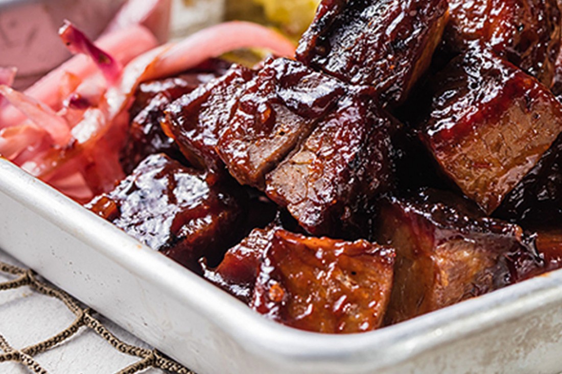 Famous Dave's Southside Rib Tips with pickled onions on the side