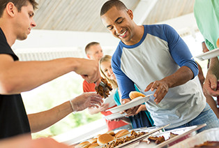 People enjoying Famous Dave's Catering Services